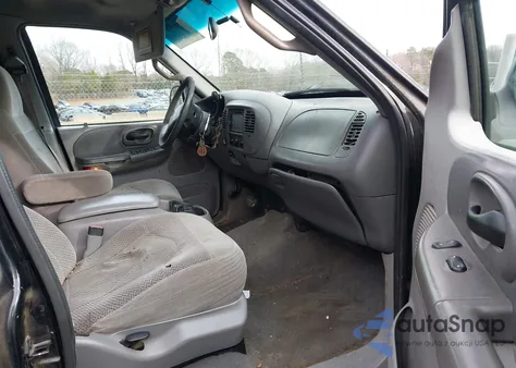 2001 Ford F-150 King Ranch Edition/Lariat/Xlt z USA, uszkodzony, nr VIN 1FTRW08L01KE15751